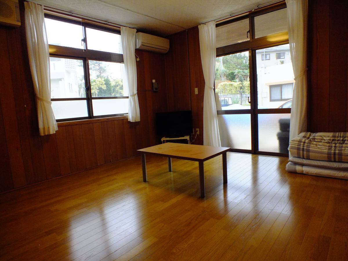 Sea Blue Hotel Onna Bagian luar foto