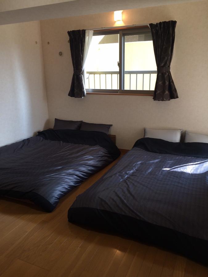 Sea Blue Hotel Onna Bagian luar foto