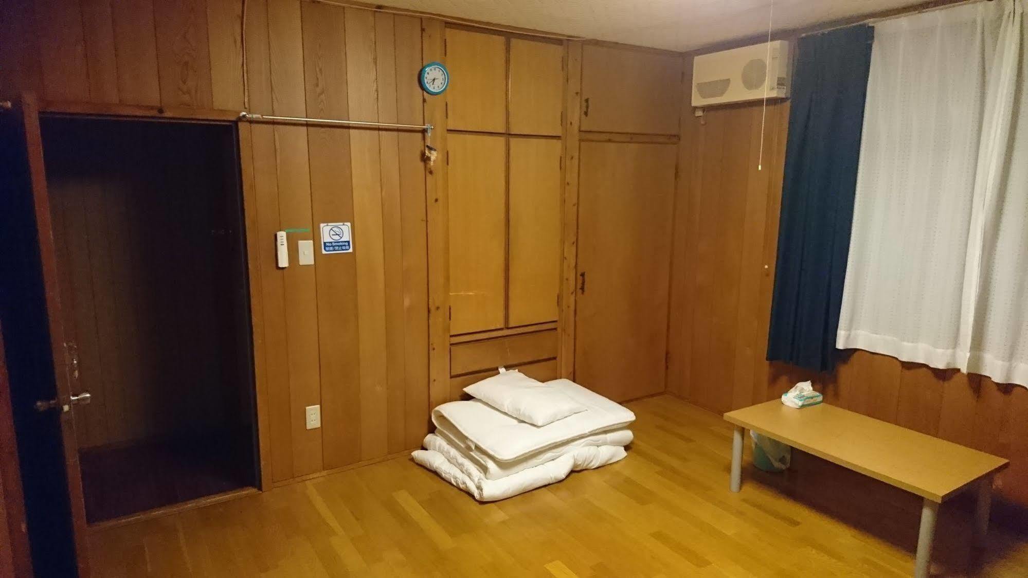 Sea Blue Hotel Onna Bagian luar foto